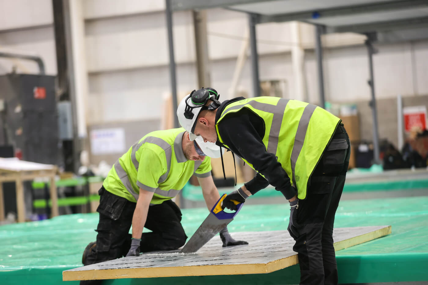 two McAvoy employees cutting